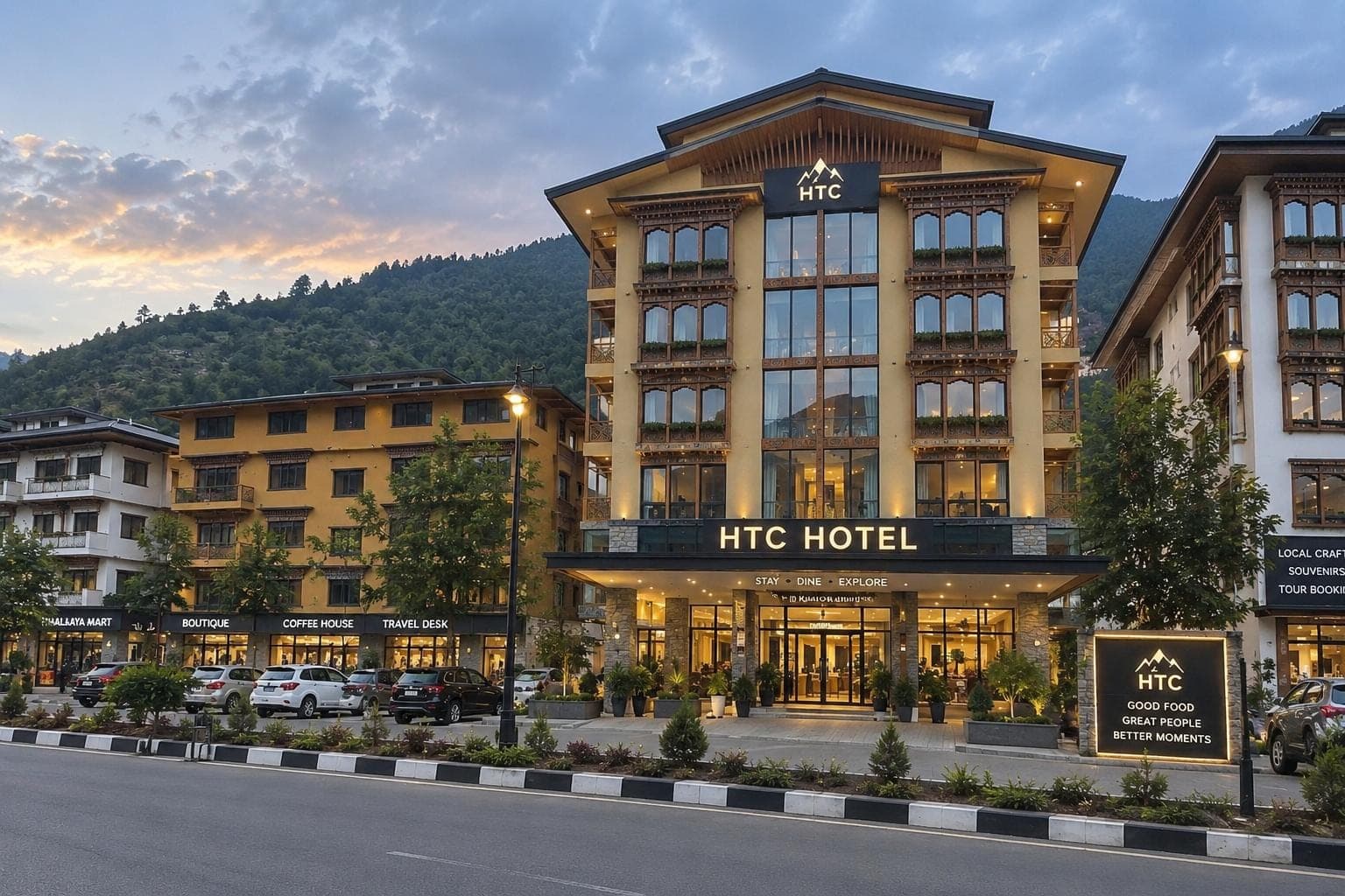 Illustration: Hotel HTC's Bhutanese-style building at dusk with the mountains behind